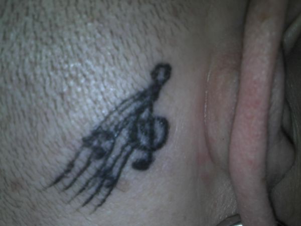 Musical Note Behind Ear